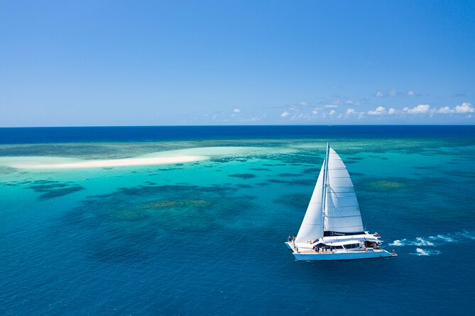 Outer Reef Mackay Cay Sail & Snorkel Adventure From Port Douglas - Sailing and Snorkeling Experience