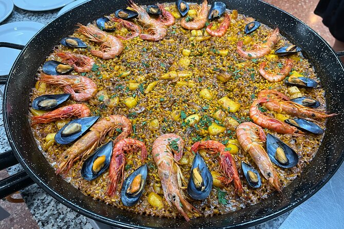 Seafood Paella Cooking Class, Tapas and Visit to Ruzafa Market. - Common questions