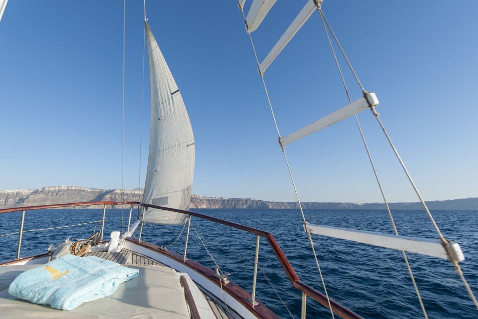 Santorini: Traditional Wooden Boat Tour With Meal and Wine - Common questions