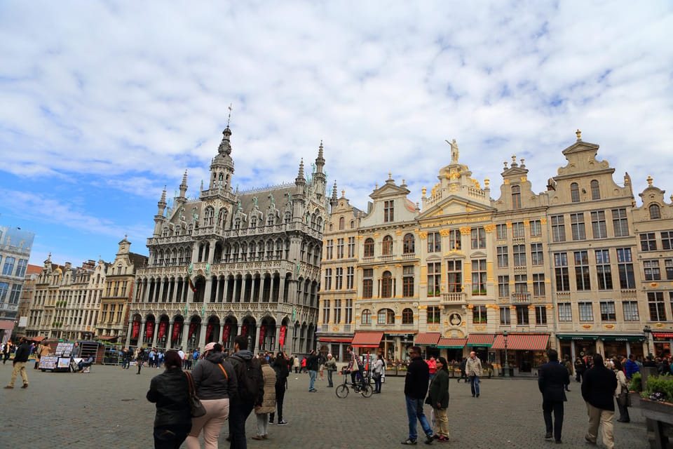 From Amsterdam: Guided Day Trip to Brussels and Bruges - Tour Duration and Cancellation Policy