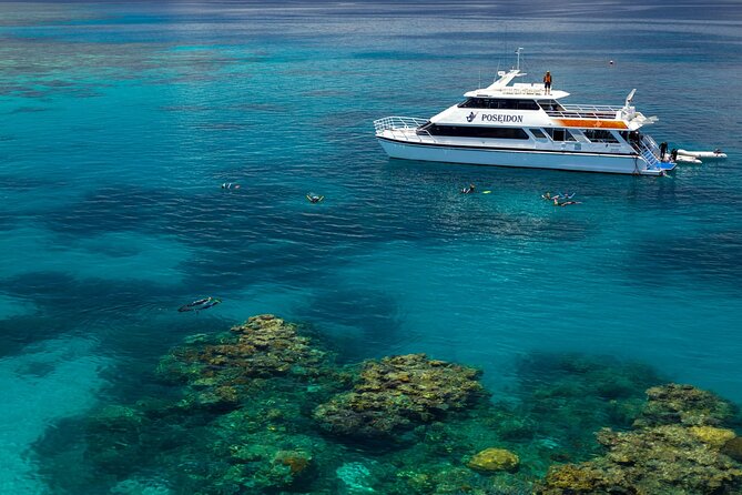 Poseidon Outer Great Barrier Reef Snorkeling and Diving Cruise From Port Douglas - Cancellation and Refund Policy