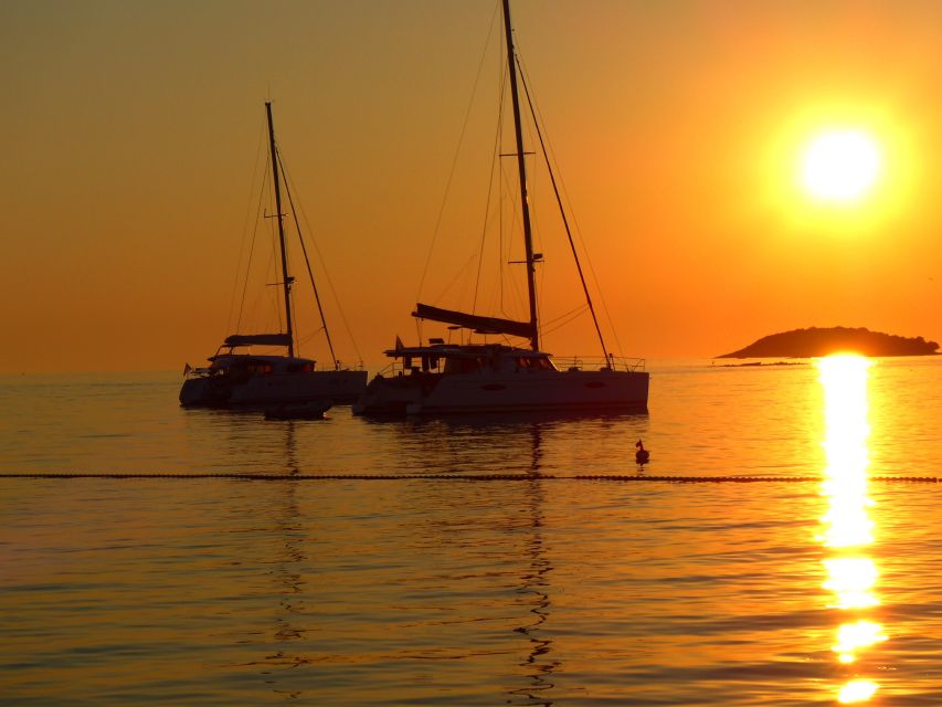 Milos: Kleftiko Bay Catamaran Cruise With Meal & Sunset View - Itinerary Highlights