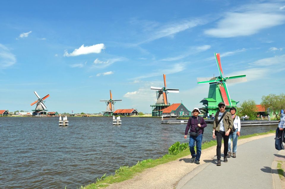 Amsterdam: Zaanse Schans, Volendam & Edam Live Guided Tour - Amsterdam Canal Cruise