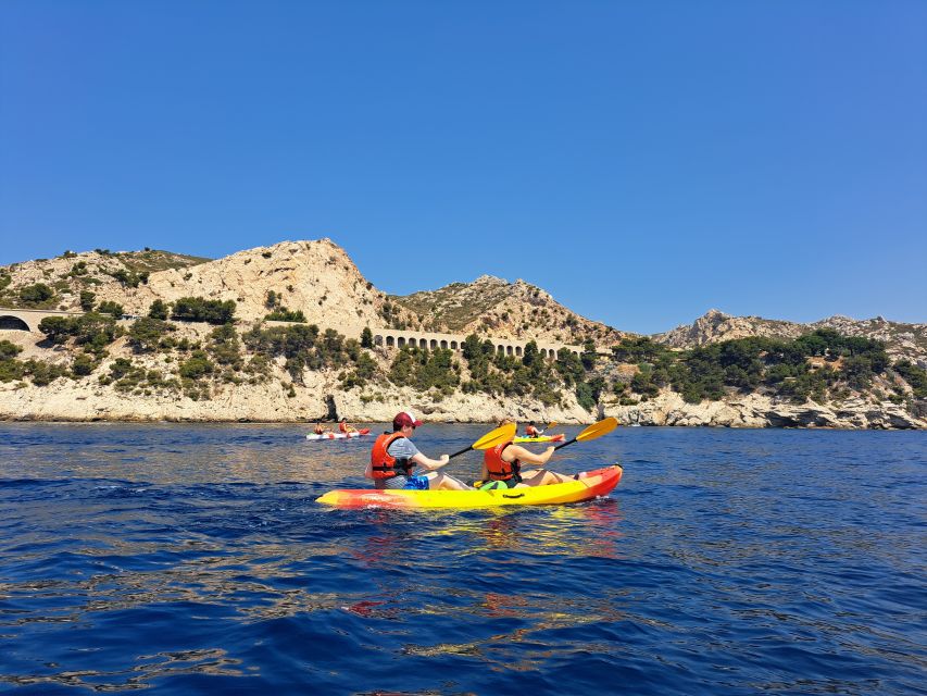 Marseille: Blue Coast Calanques Half-Day Kayak Tour - Language and Cancellation Policy