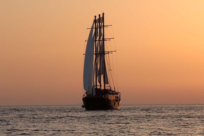 Santorini Caldera Sunset Sailing Cruise With Dinner and Wine - Sunset Experience Highlights