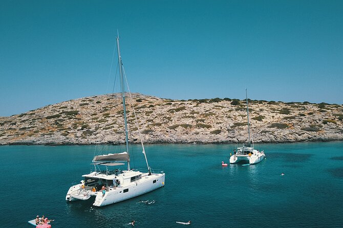 Agios Nikolaos Evening Catamaran Cruise in Mirabello With Dinner - Cancellation Policy